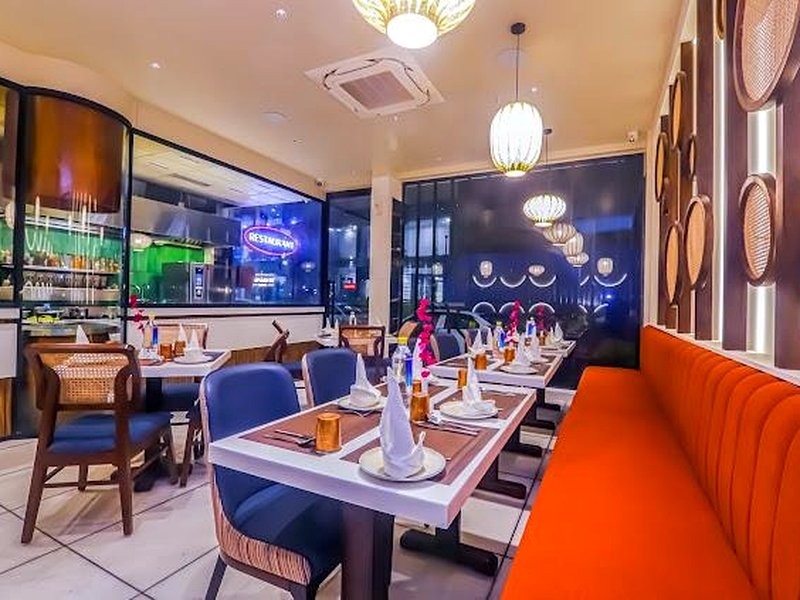 Plush Banquette Booth Dining at The Indian Grill