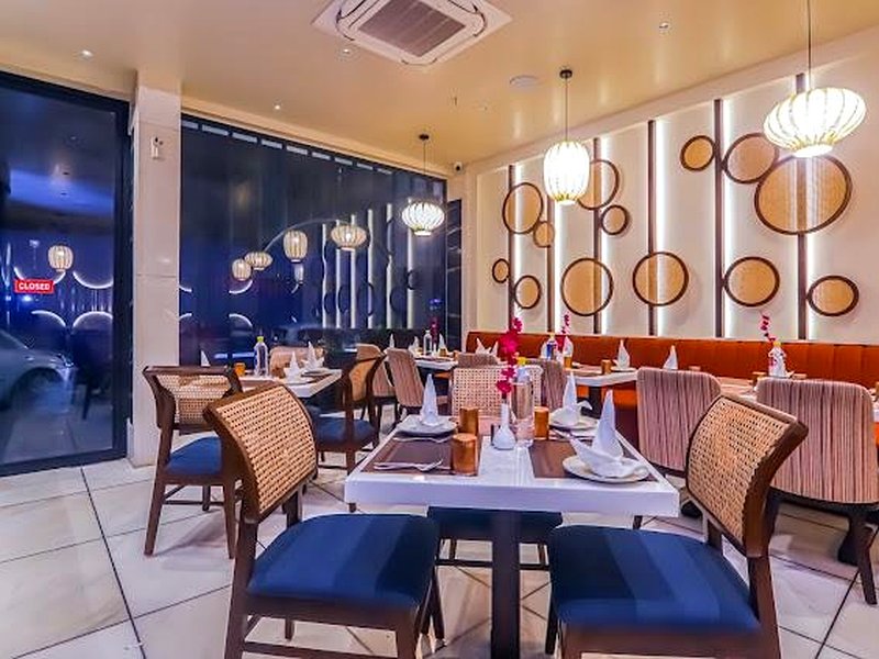 Intimate Table Settings and Lanterns at The Indian Grill